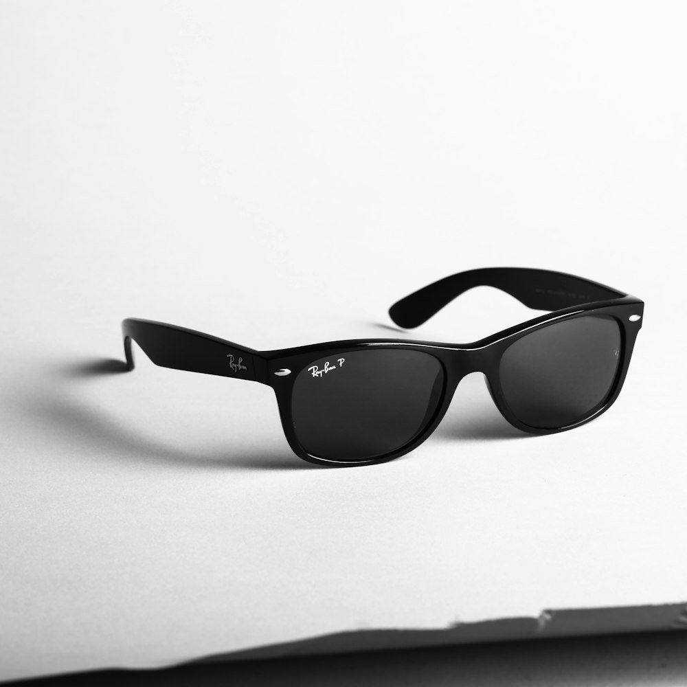 Black wayfarer sunglasses close-up